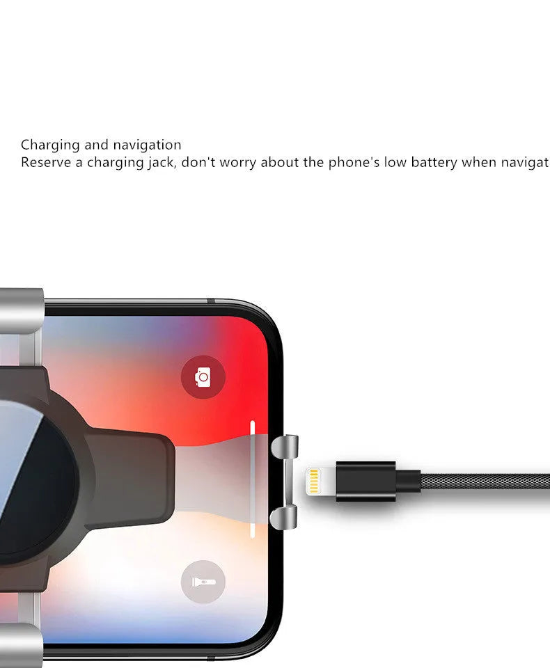 S4 Gravity Mirror ABS mobile phone bracket mounted on a car air conditioning vent.