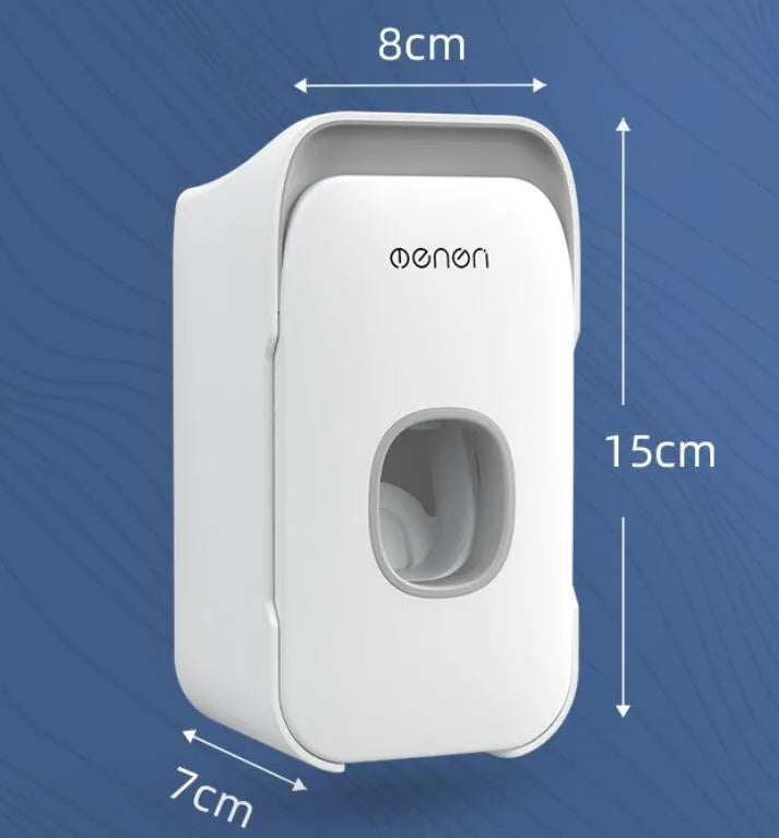 Automatic touchless toothpaste dispenser in blue colour mounted on a bathroom wall.