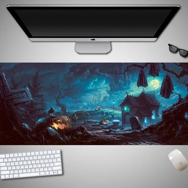 Large Halloween-themed computer mouse pad with graphic design on a desk
