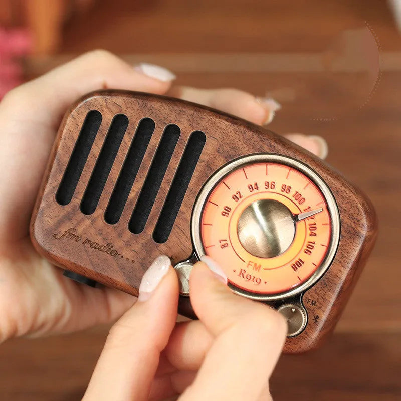 Retro wooden Bluetooth speaker in natural wood finish with compact dimensions