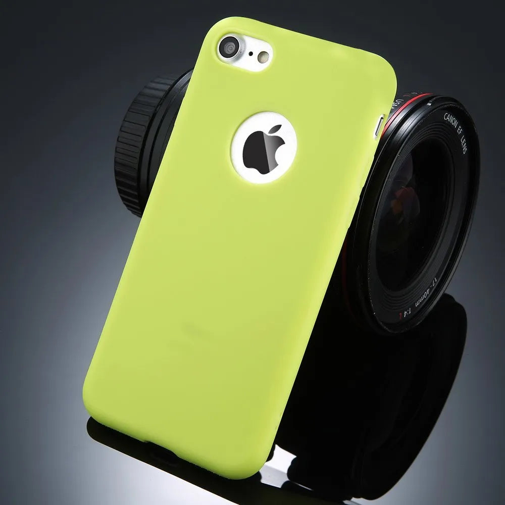Candy colour soft silicon TPU back cover case for iPhone on a plain background.