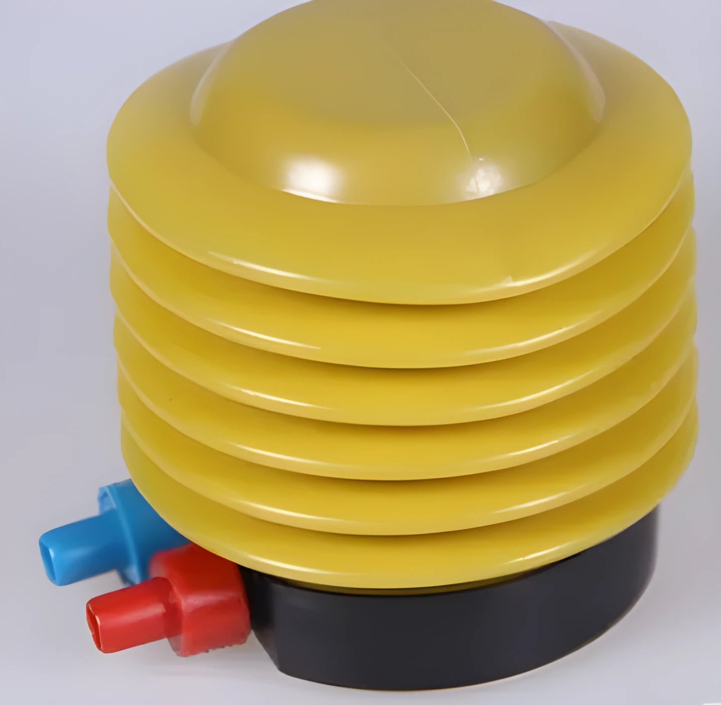 Blue and red portable manual pedal pump for inflating swim rings, showing 4-inch diameter.