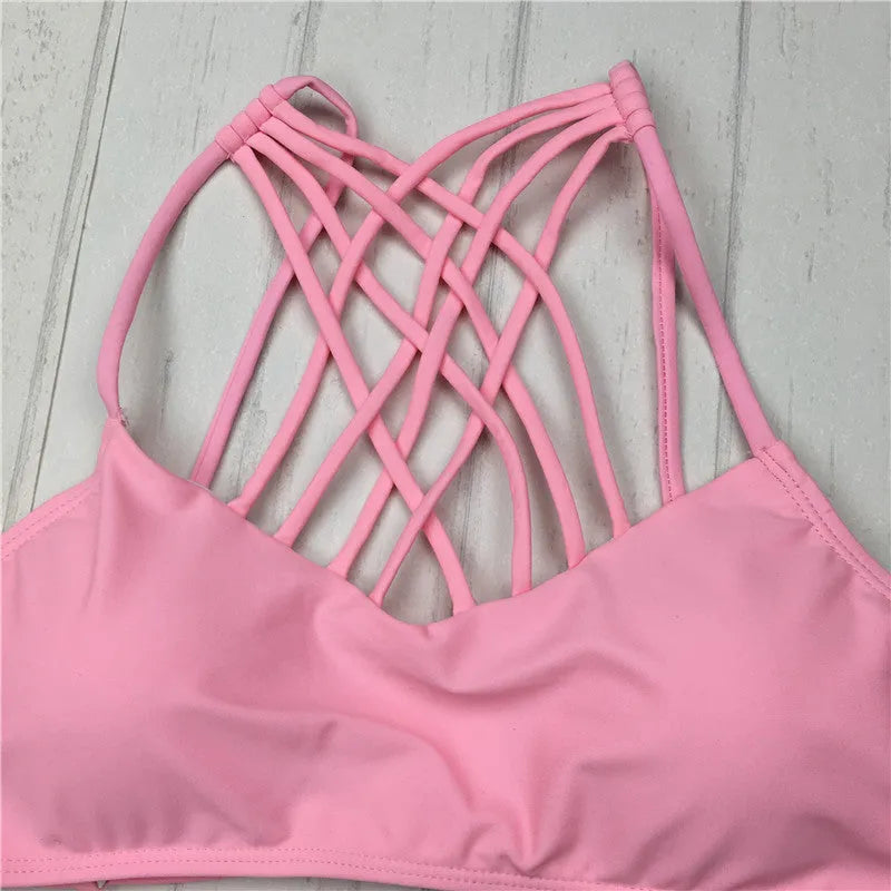 Women's pink bandage halter bikini swimsuit with cut out cross front design
