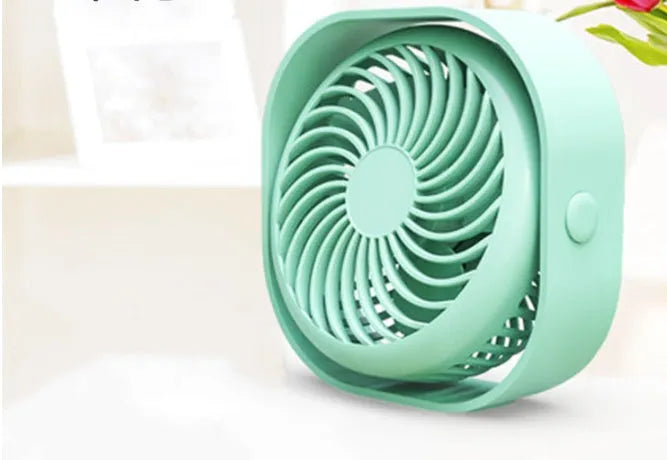 USB desk fan with alarm clock showing 360-degree rotation and rotary switch in blue colour