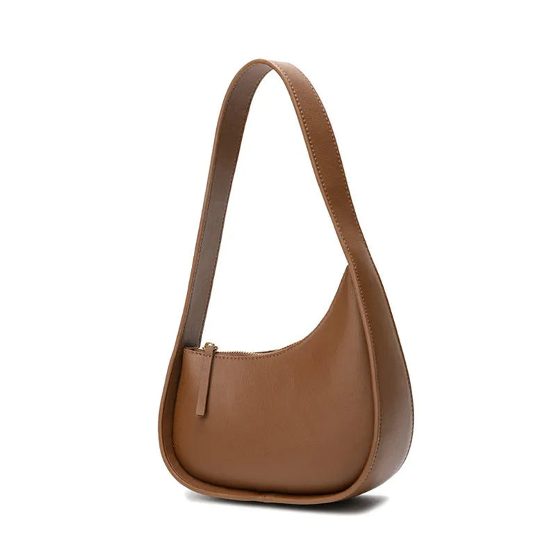 Genuine leather half moon ladies shoulder bag with wide strap and zipper closure in small size