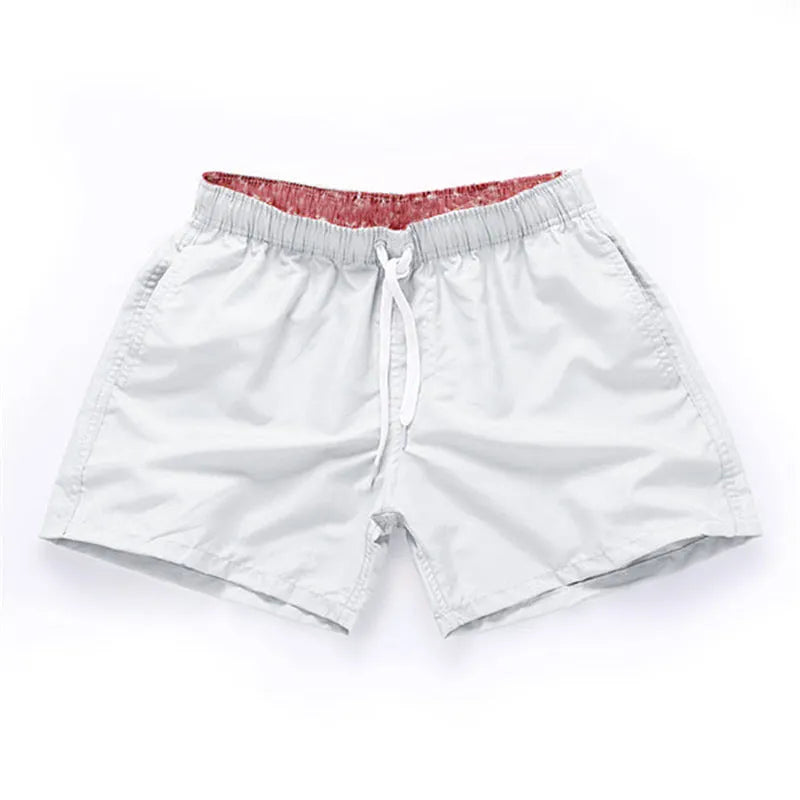 Men's plus size straight-leg beach shorts in multiple colours on a size chart.
