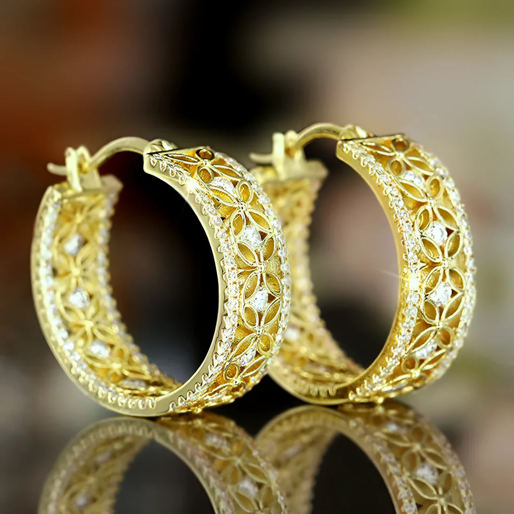 Copper geometric ear clips with horse eye, flower and butterfly designs in yellow gold finish