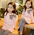 A pink two-piece cotton clothing set for a young girl, shown in sizes 110cm to 140cm.