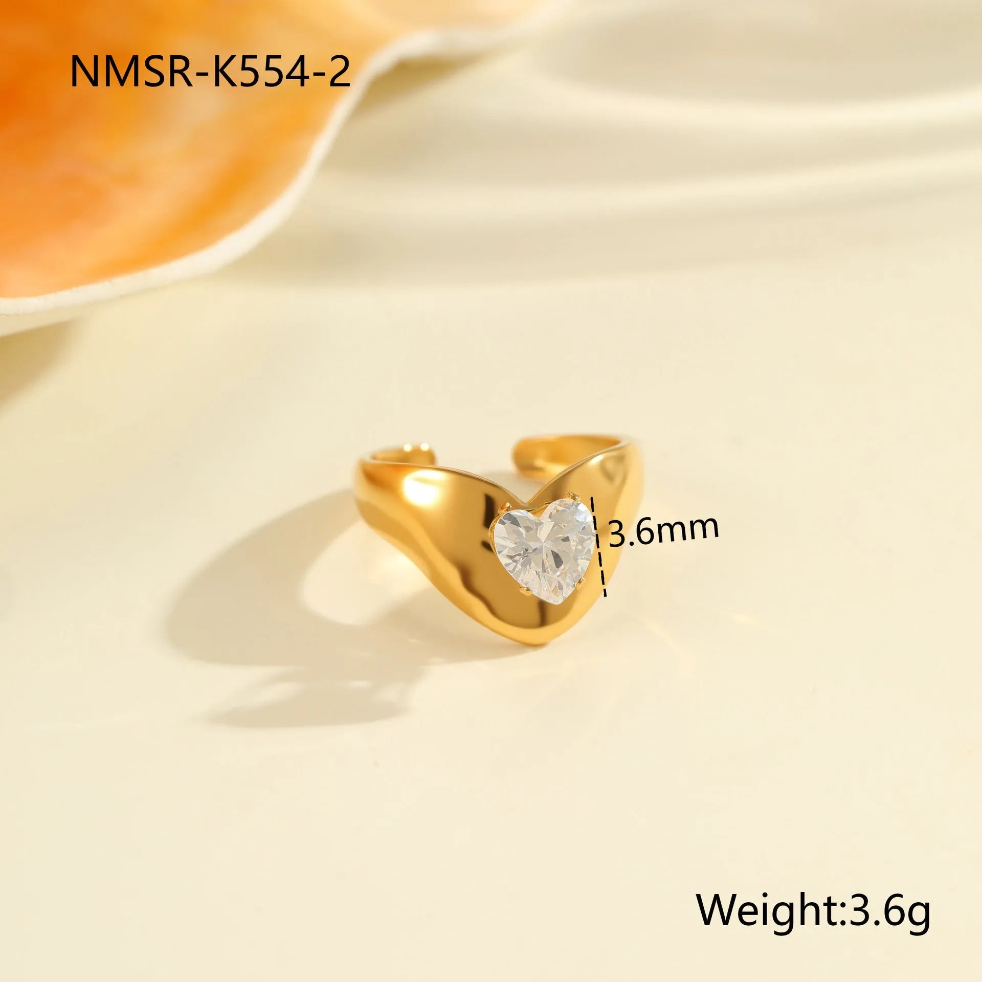 Geometric stainless steel zircon ring with open mouth design showing round, oval and quadrangle elements