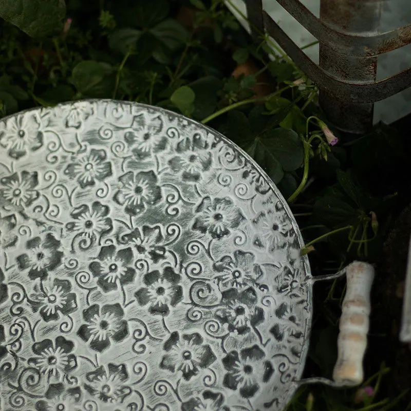 Round wrought iron metal storage tray in two sizes for jewellery and home organisation.