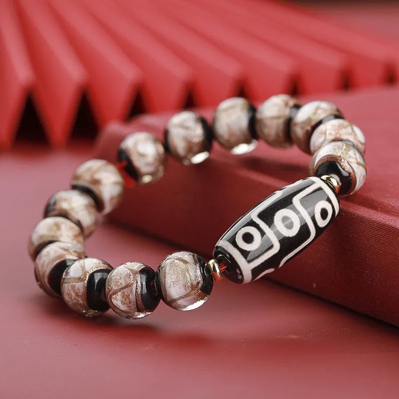 Ancient Chinese style coloured glaze bracelet with snake motif and multi-colour beads