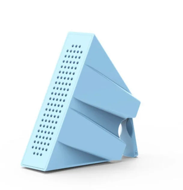 Mini portable phone amplifier bracket for Apple iPhone on a desktop in pink colour.