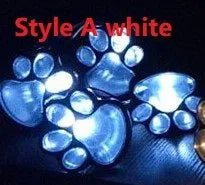 Black bear paw-shaped solar garden lights with solar panel pole for outdoor pathway illumination