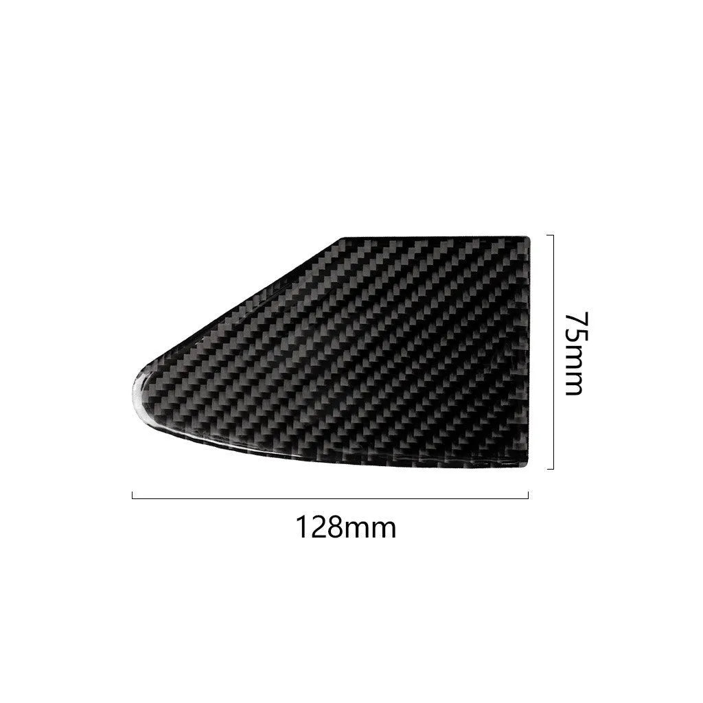 Carbon fibre decorative sticker with adhesive backing for covering a laptop or desktop USB charging port.
