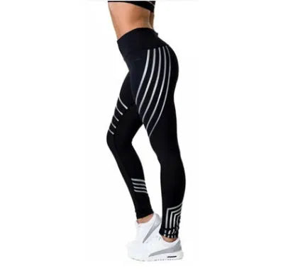 Women's black and white glow-in-the-dark workout leggings with slim-fit design