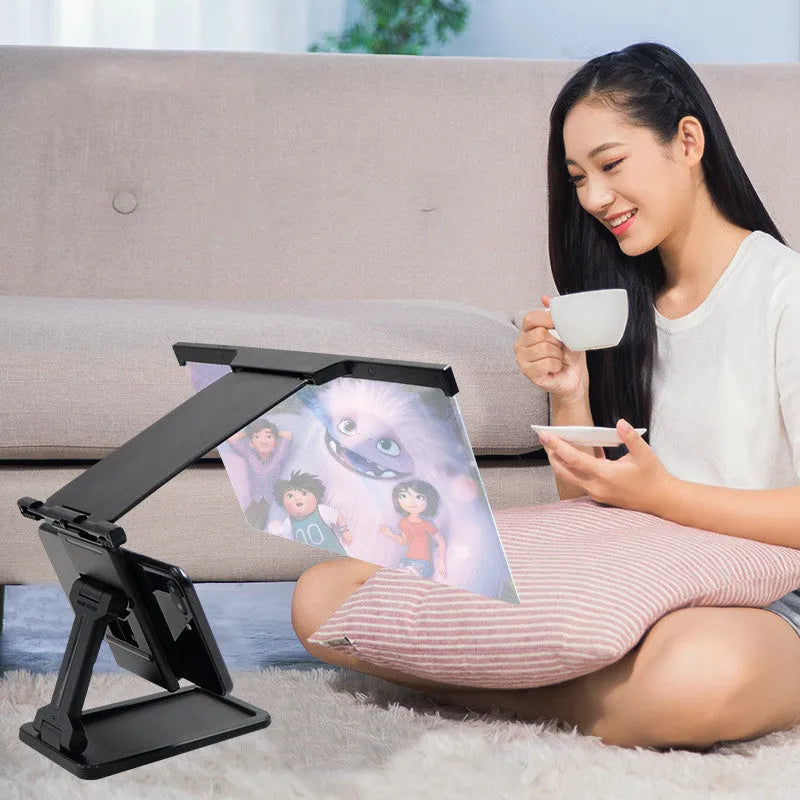 Black L20 split mobile phone screen magnifier with acrylic lens and separate plastic support bracket.
