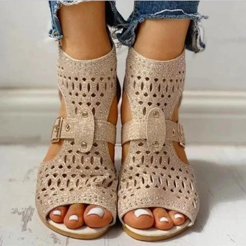 Women's beige casual sandals with a low wedge heel, back zipper, and fish mouth toe.