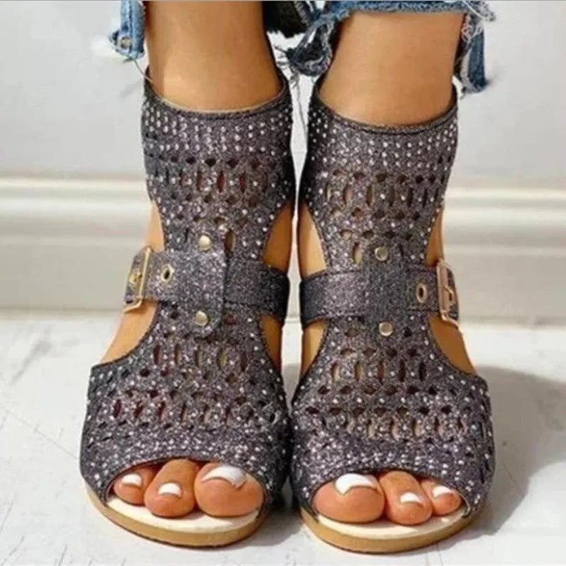 Women's beige casual sandals with a low wedge heel, back zipper, and fish mouth toe.