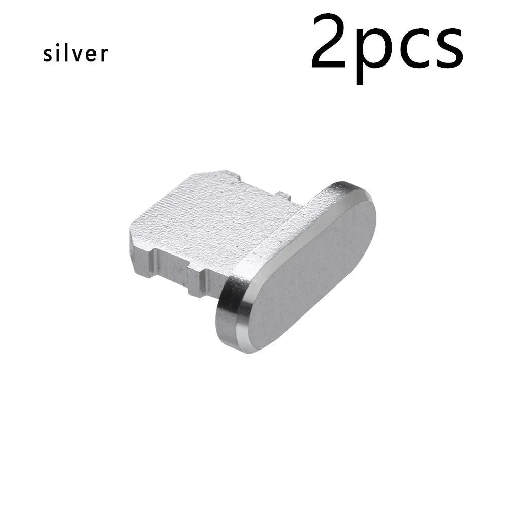 Aluminium alloy iPhone charging port dust plug in various colours including gold, silver, blue, and rose gold.