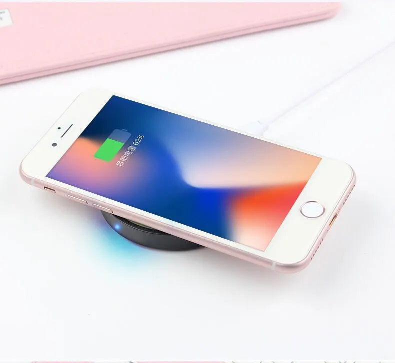 Square Qi wireless charging pad for mobile phones, shown in one of six colour options.
