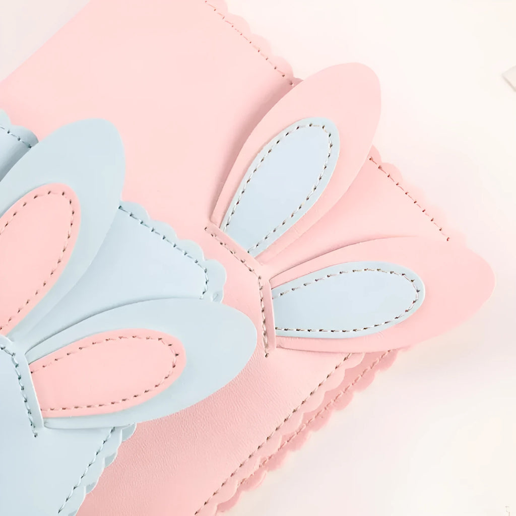 Mini rabbit style photo album in three colours showing loose-leaf design for 3-inch photographs