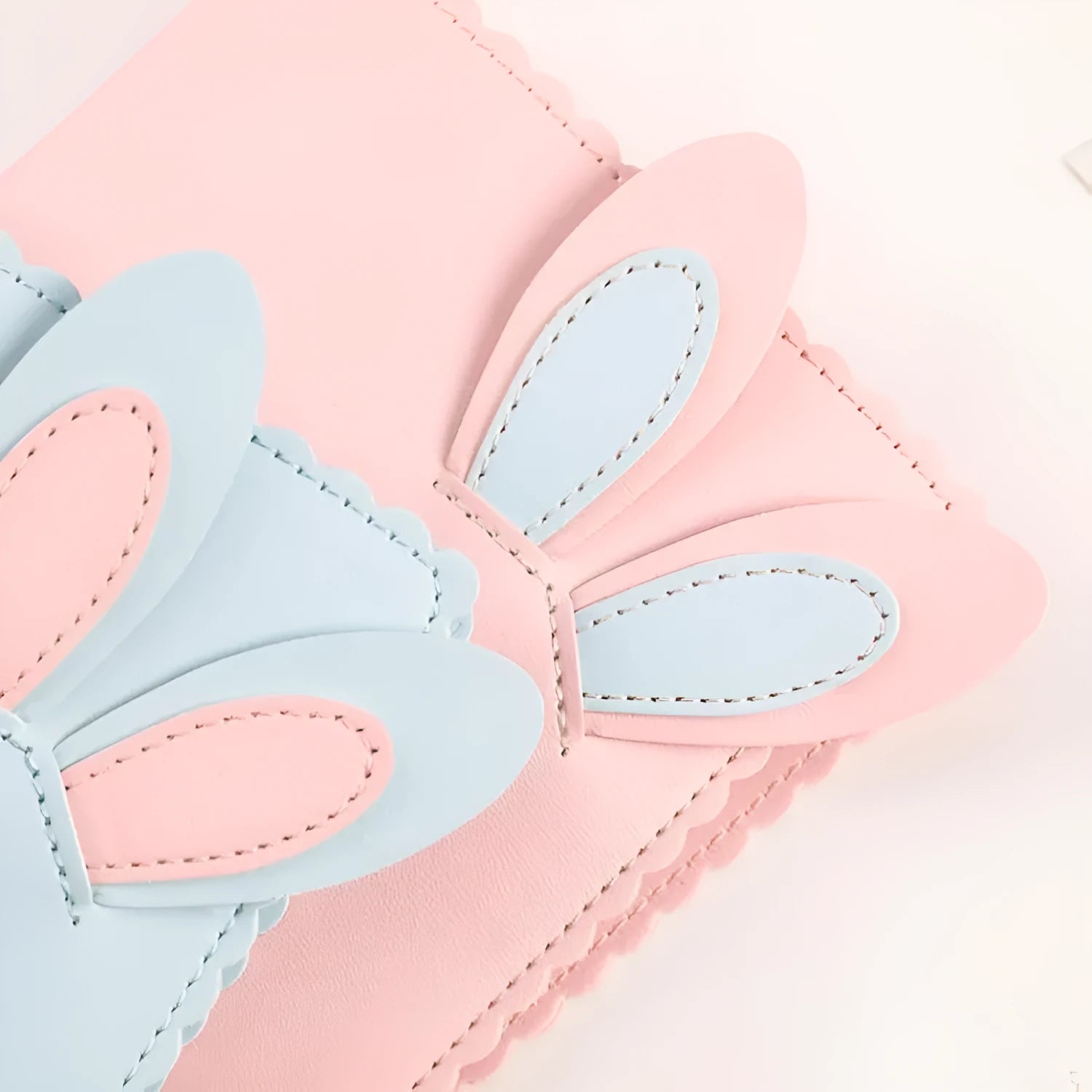 Mini rabbit style photo album in three colours showing loose-leaf design for 3-inch photographs