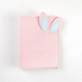 Mini rabbit style photo album in three colours showing loose-leaf design for 3-inch photographs