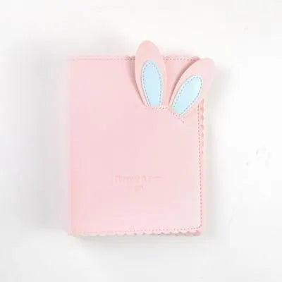 Mini rabbit style photo album in three colours showing loose-leaf design for 3-inch photographs