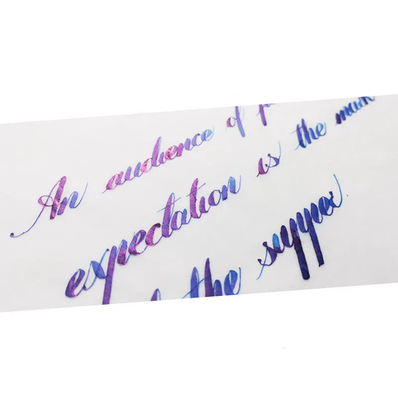 Bottle of MEMORY-0420 strong sheen gradient colour ink with gold powder for fountain and dip pens.