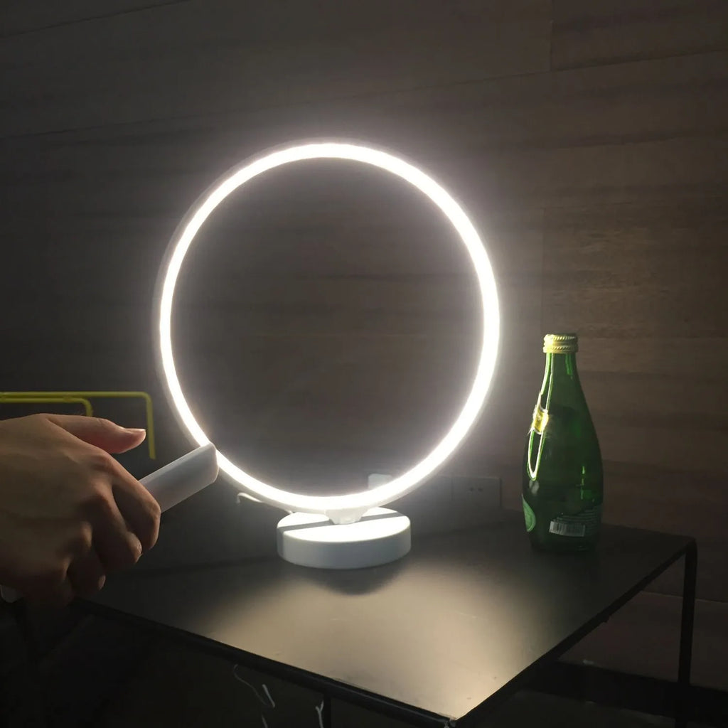 Full Moon Lamp table lamp with circular design showing adjustable white and coloured lighting options