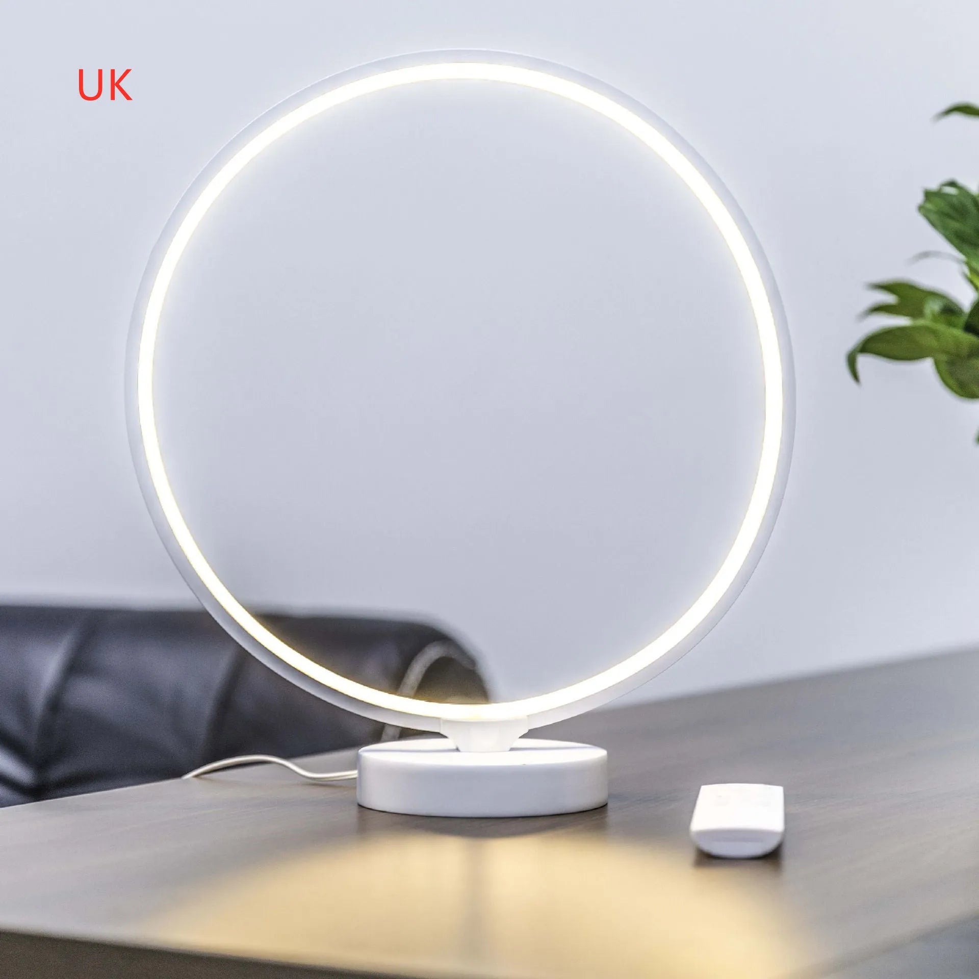 Full Moon Lamp table lamp with circular design showing adjustable white and coloured lighting options