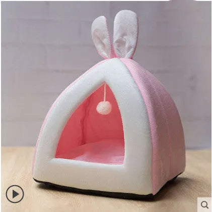 Grey fabric cat house with plush interior shown in medium size