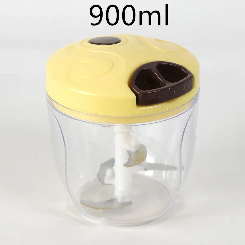 Manual kitchen chopper with green ABS container and stainless steel blades for herb and vegetable preparation
