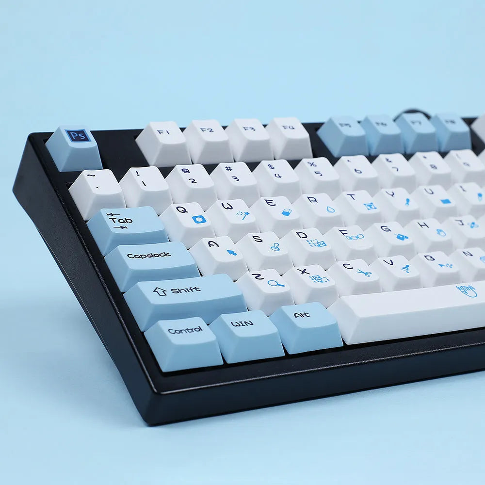 PS theme DIY keycaps in blue and white sublimation design arranged next to grey and white variant