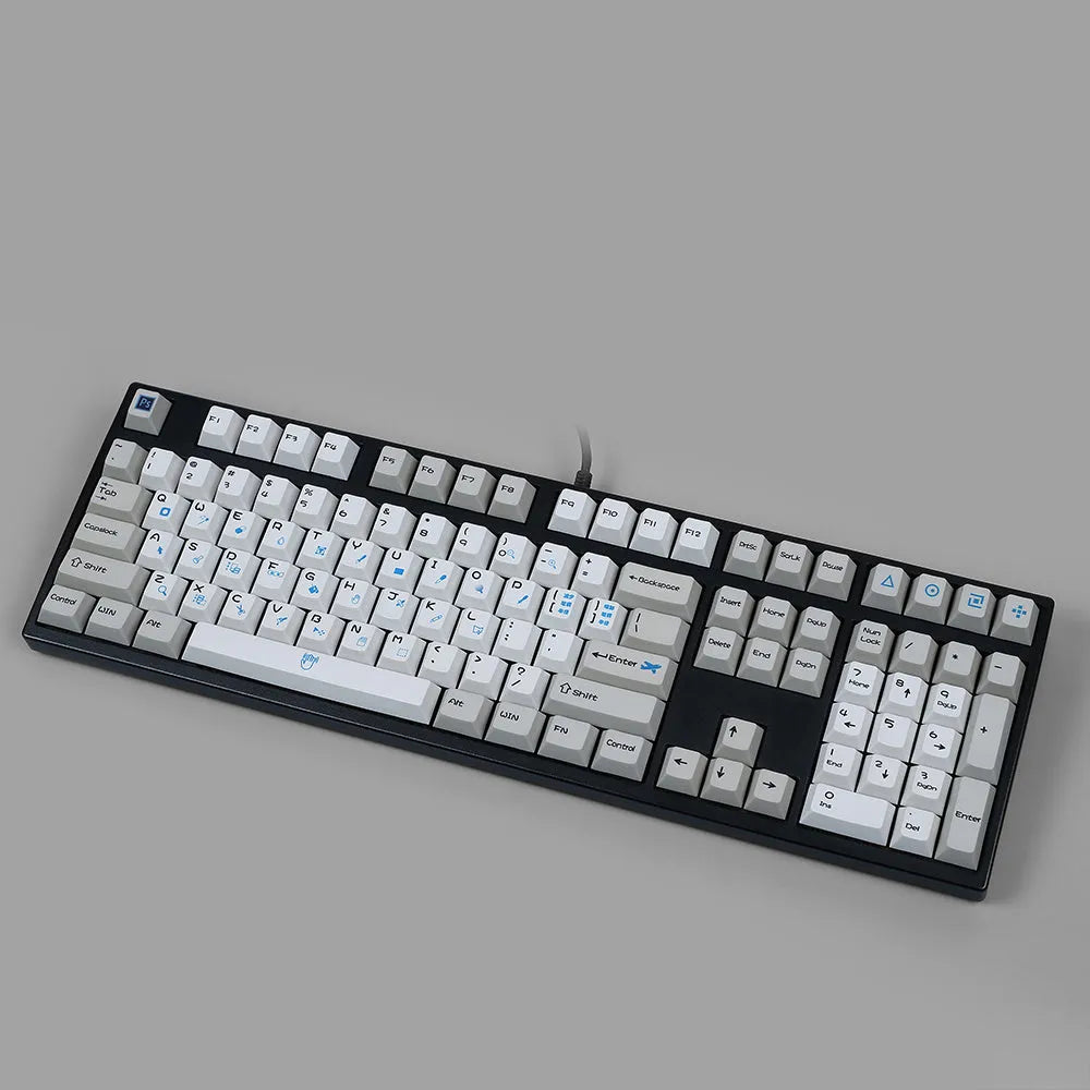 PS theme DIY keycaps in blue and white sublimation design arranged next to grey and white variant