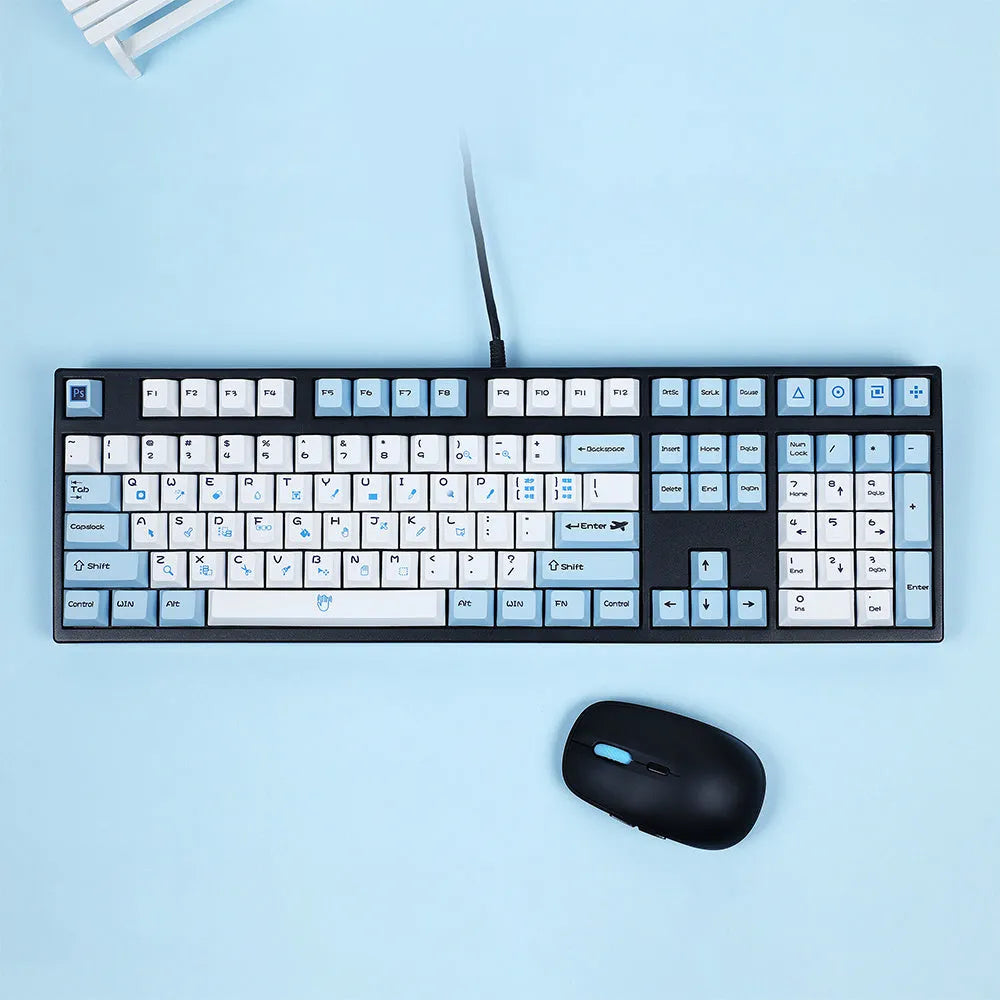 PS theme DIY keycaps in blue and white sublimation design arranged next to grey and white variant