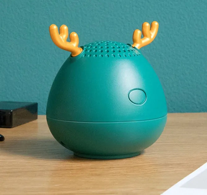 Compact Bluetooth speaker in white, pink, or green colours showing 75mm by 88mm dimensions