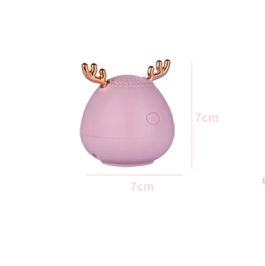 Compact Bluetooth speaker in white, pink, or green colours showing 75mm by 88mm dimensions