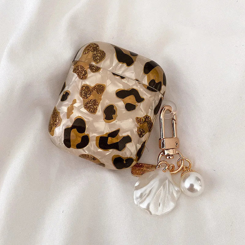 Shell yellow leopard print TPU flip case for Apple AirPods Pro and AirPods with choice of pearl chain or ornament attachments