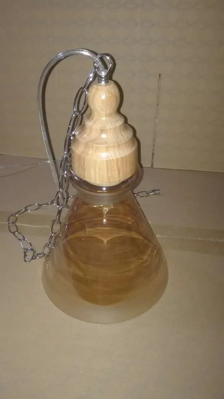 Glass wood grain single head pendant light with adjustable cable in a Nordic style