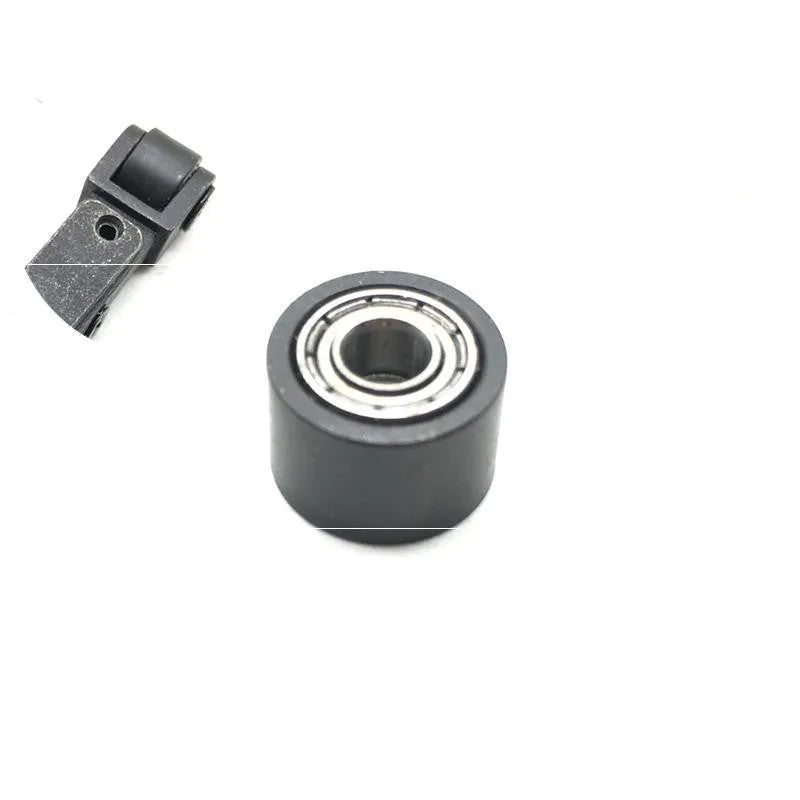Metal rollers and accessories for a pneumatic belt strapping machine.