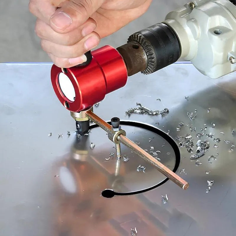 Red metal nibbler cutter attachment for electric drills used to cut sheet metal plates