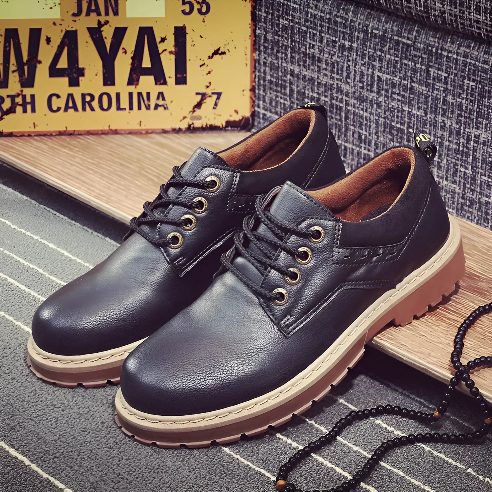 Men's brown casual shoes with round toe and front lace closure showing rubber sole detail