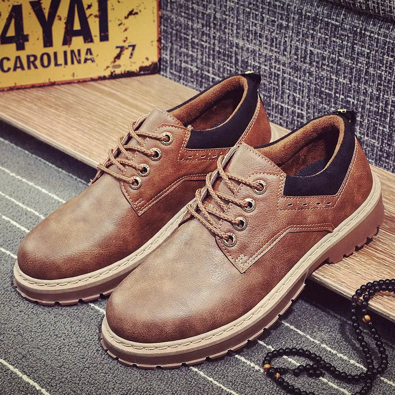 Men's brown casual shoes with round toe and front lace closure showing rubber sole detail