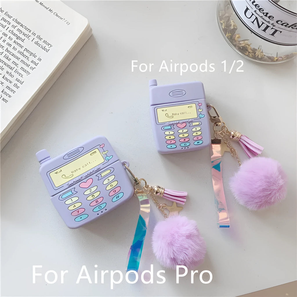 Purple silicone AirPods case with clamshell design and fur ball pendant