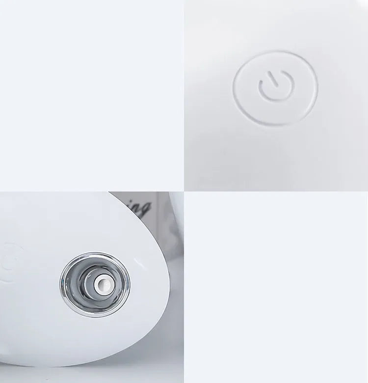 White round USB-powered aromatherapy spray humidifier on a table.