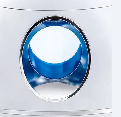 White round USB-powered aromatherapy spray humidifier on a table.