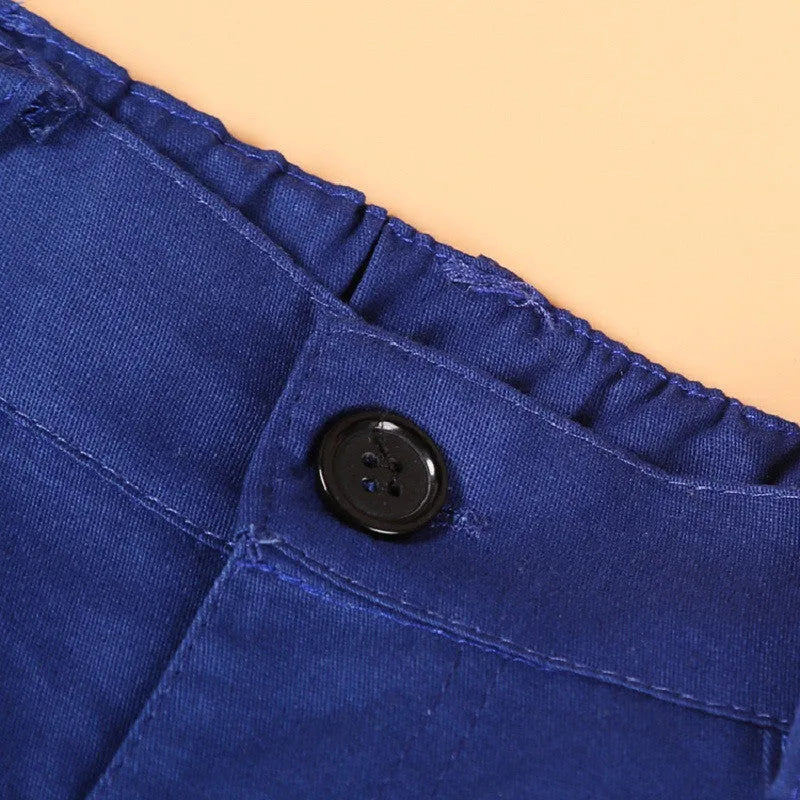 Blue boys' smart clothing set on hanger showing turtleneck, waistcoat, trousers, and tie.