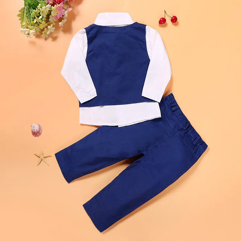 Blue boys' smart clothing set on hanger showing turtleneck, waistcoat, trousers, and tie.