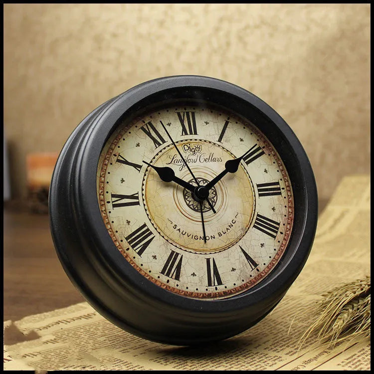 European retro style round desk clock with silent alarm function on wooden surface